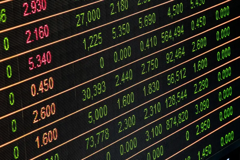 An electronic board showing market prices